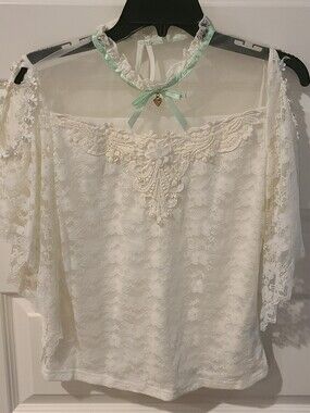 Cream Lace Off-Shoulder Blouse with Floral Appliqué